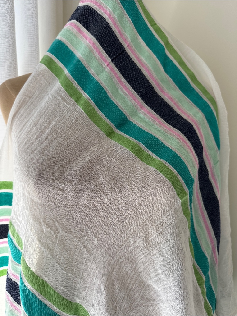 Old Navy white, navy, green and pink tasseled wrap.